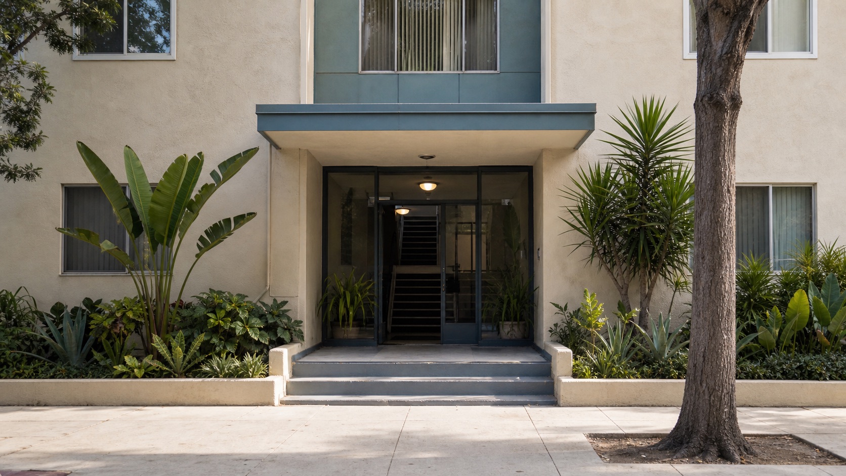 Apartment building entrance with a shared stairway